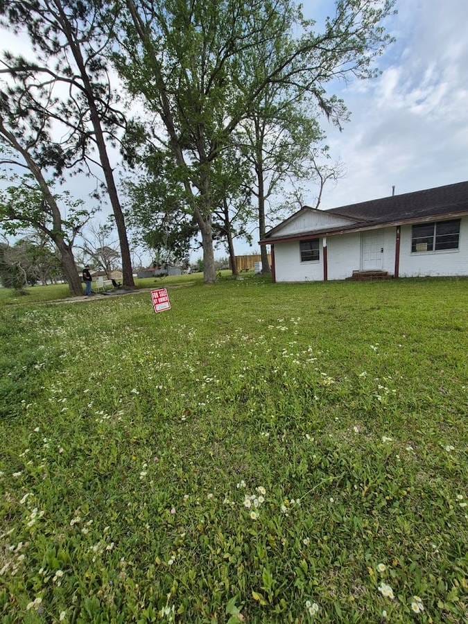 NEAR BEACH SURFSIDE , OWNER FINANCE 2 Acres 4 bedroom house